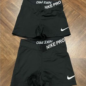 2 pair Nike PRO shorts